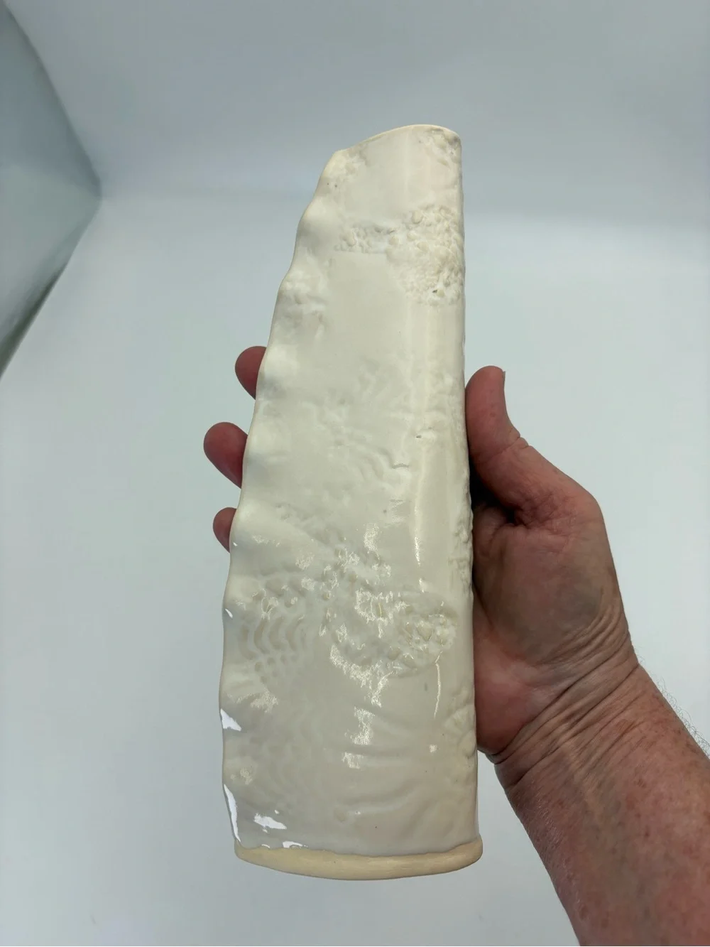 Signed Handmade Cream Ceramic Vase with Subtle Sun and Floral Texture